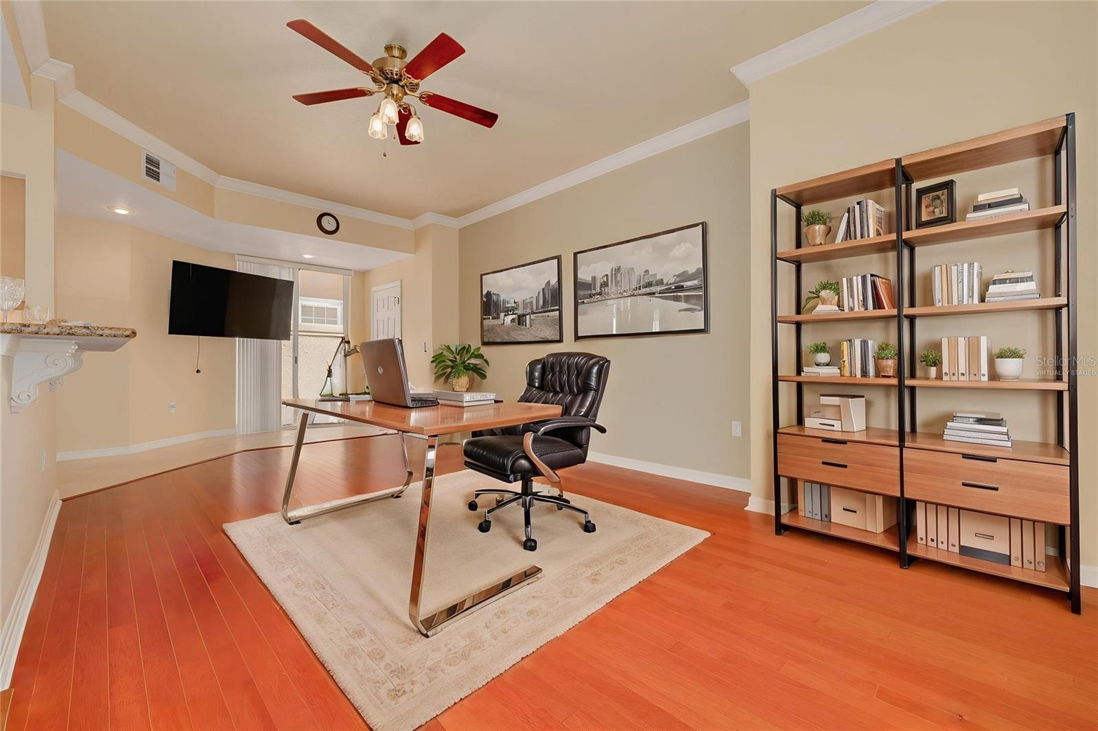 Virtually staged family room, set up as an office