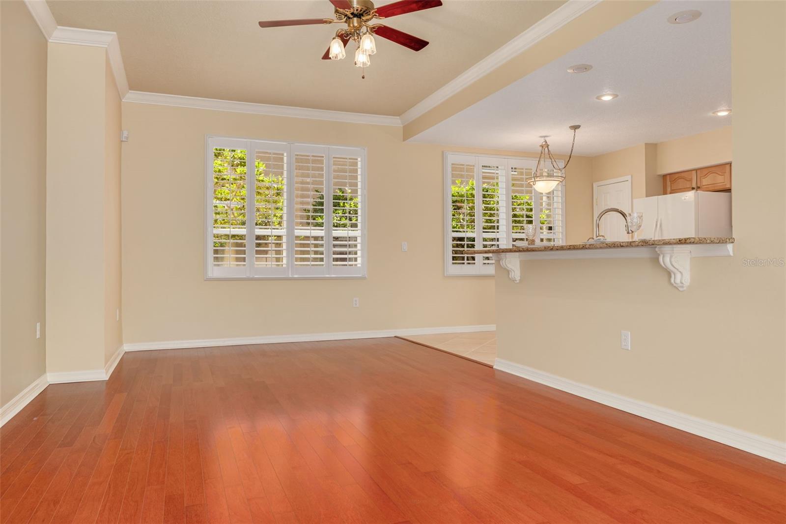 Family room, adjacent to the kitchen, with sliders to the private courtyard