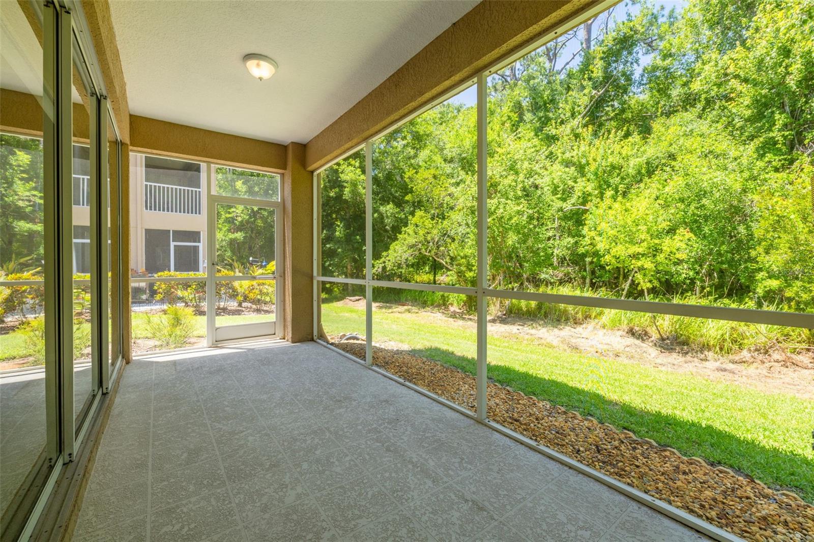 Private screened lanai overlooks conservation
