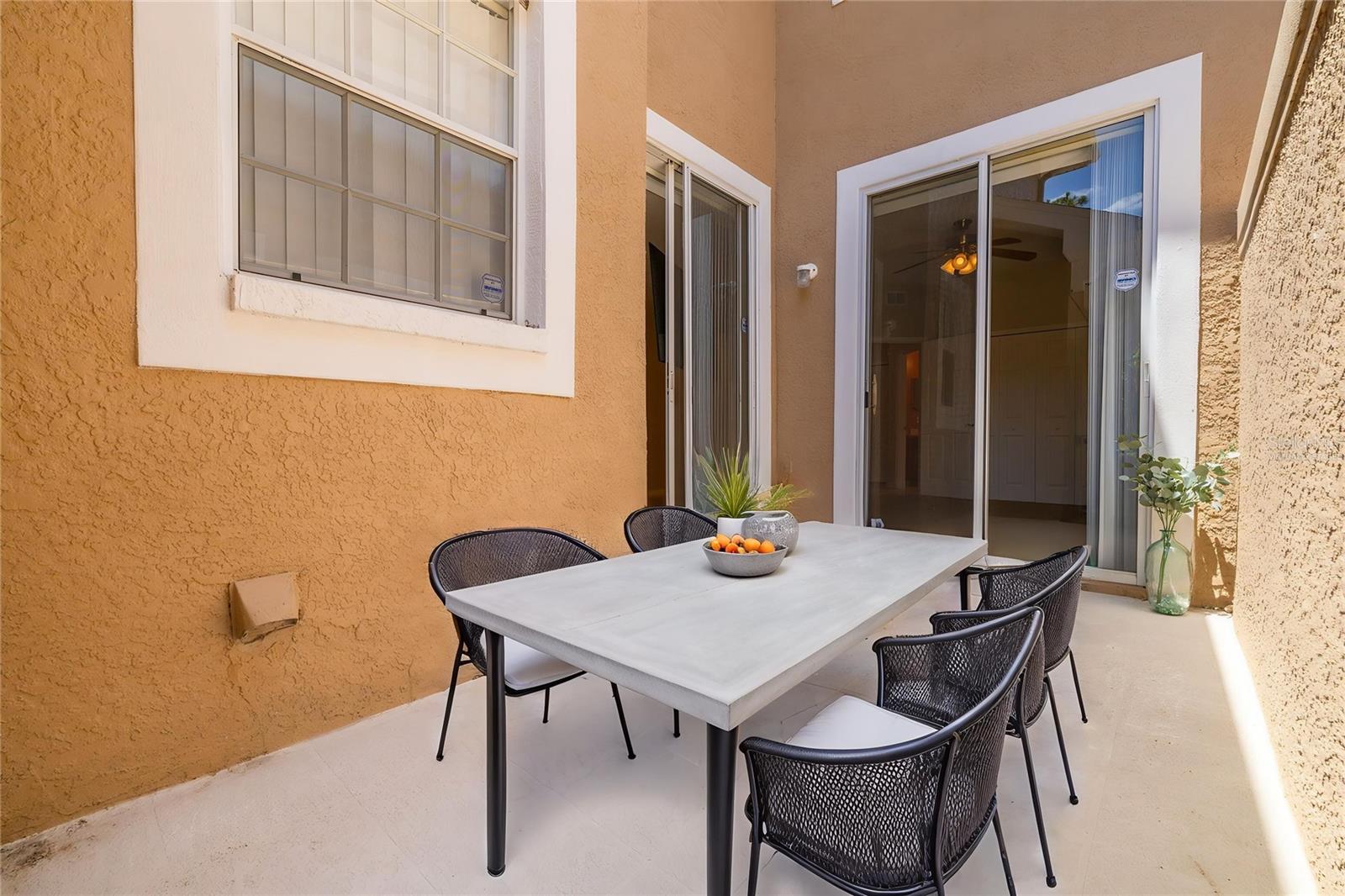Gated courtyard, virtually staged