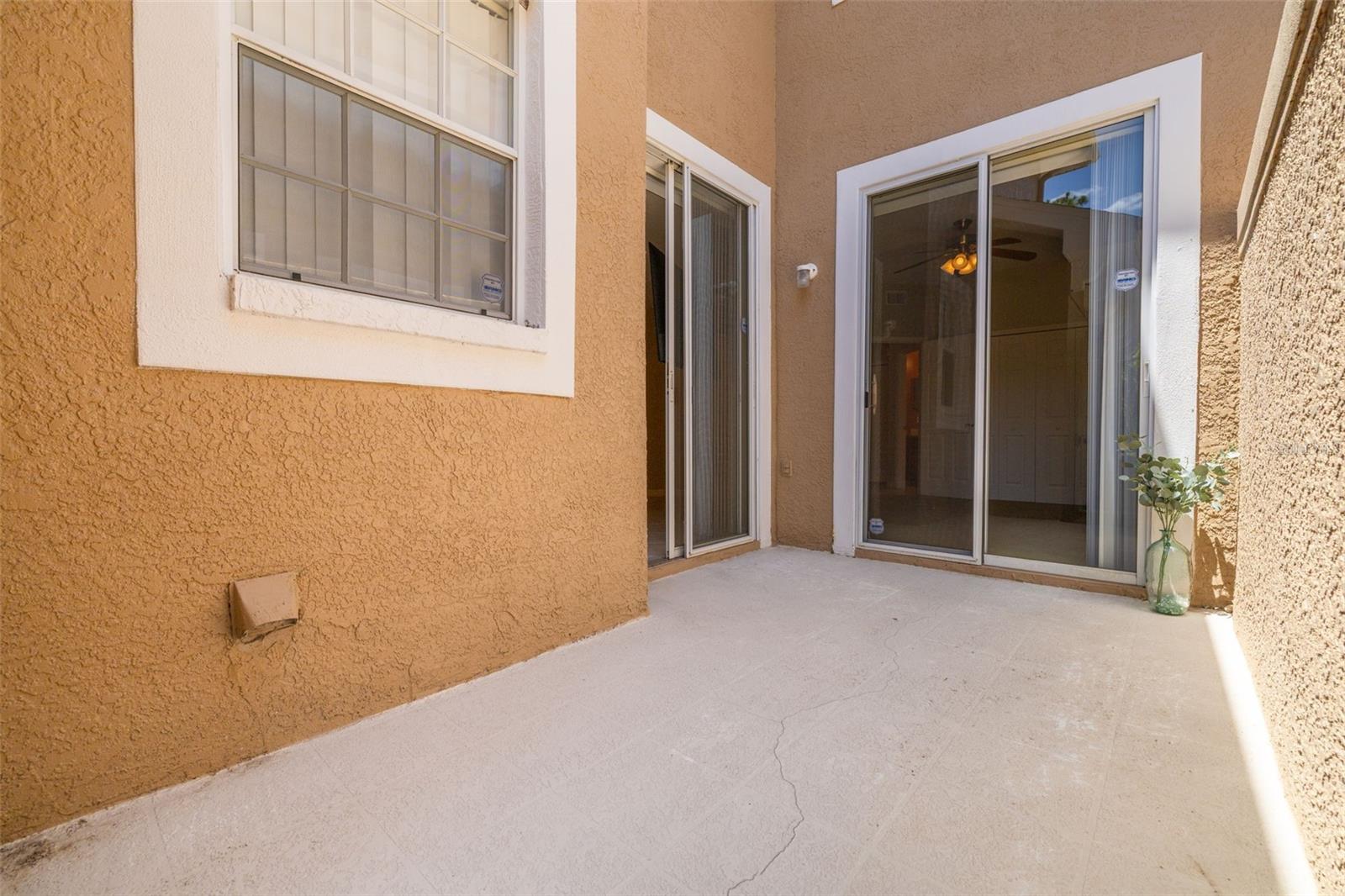 Gated courtyard with access from hallway and bedroom #2