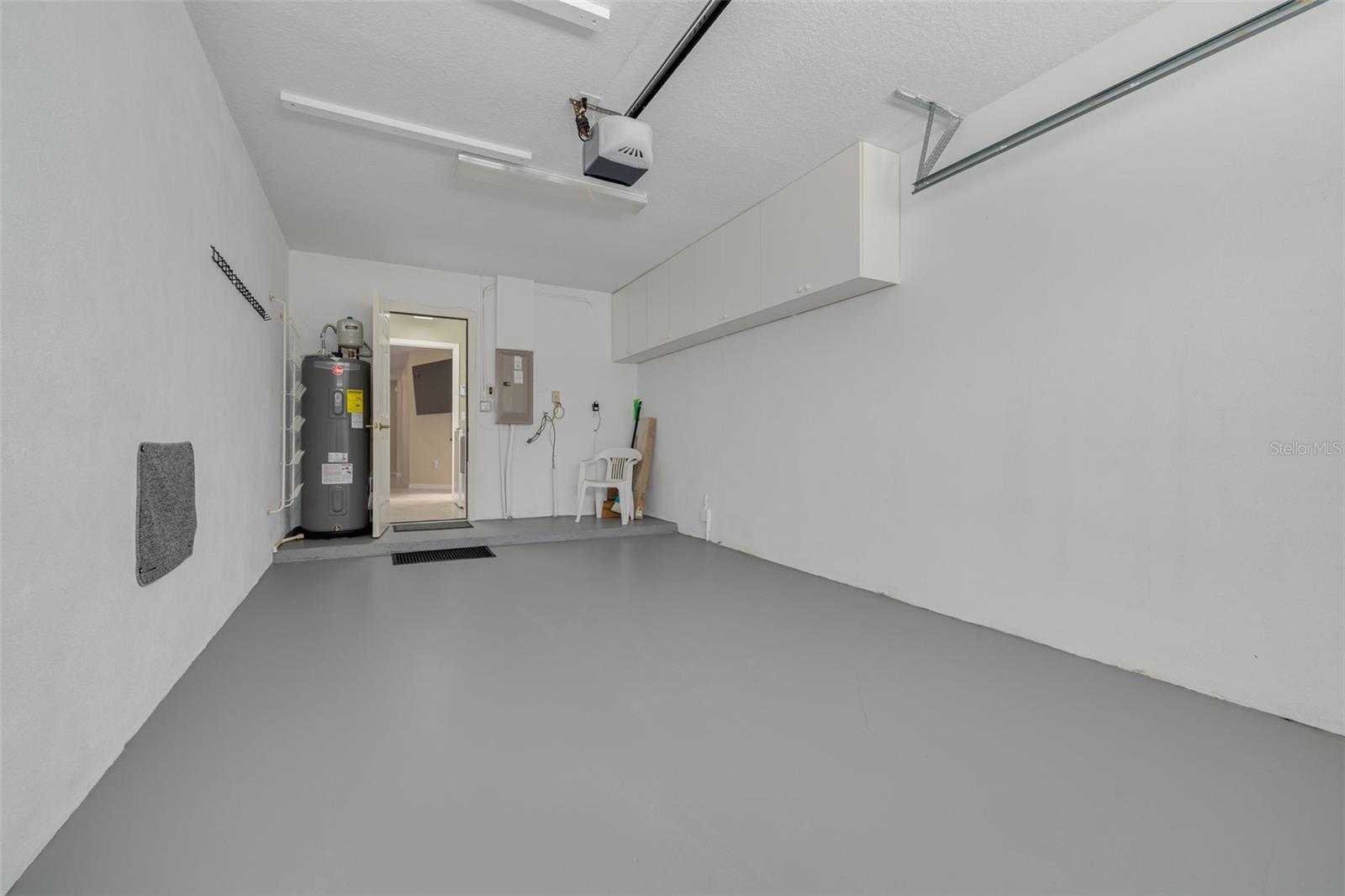 Spotless one-car garage with 2025 water heater!