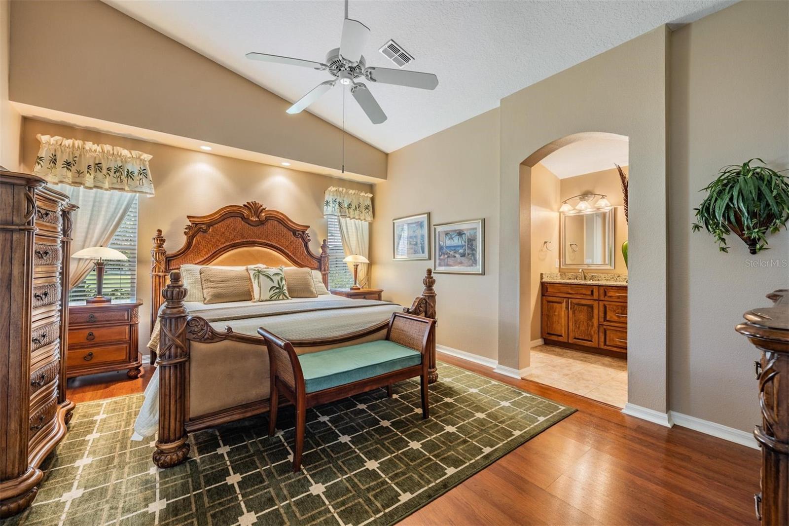 Primary bedroom also with vaulted ceilings