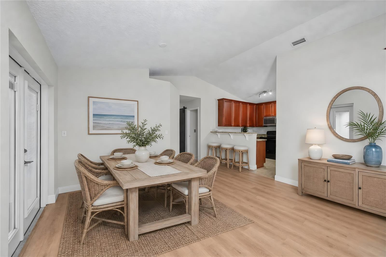 Virtually Staged -Comfortable dining space ideal for family meals, game nights, or hosting guests.