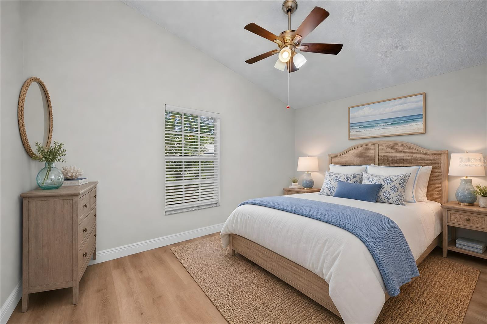 Virtually Staged - Spacious primary bedroom with plenty of room for a king-size bed and additional furnishings.