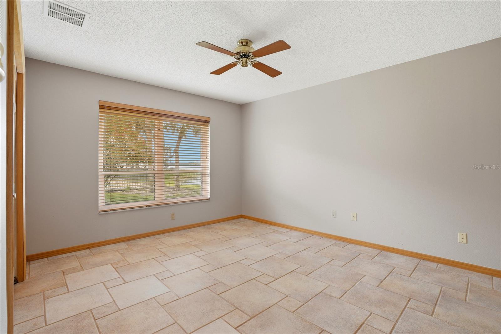 Bedroom 2 With Lake view andhurricane impact rated window