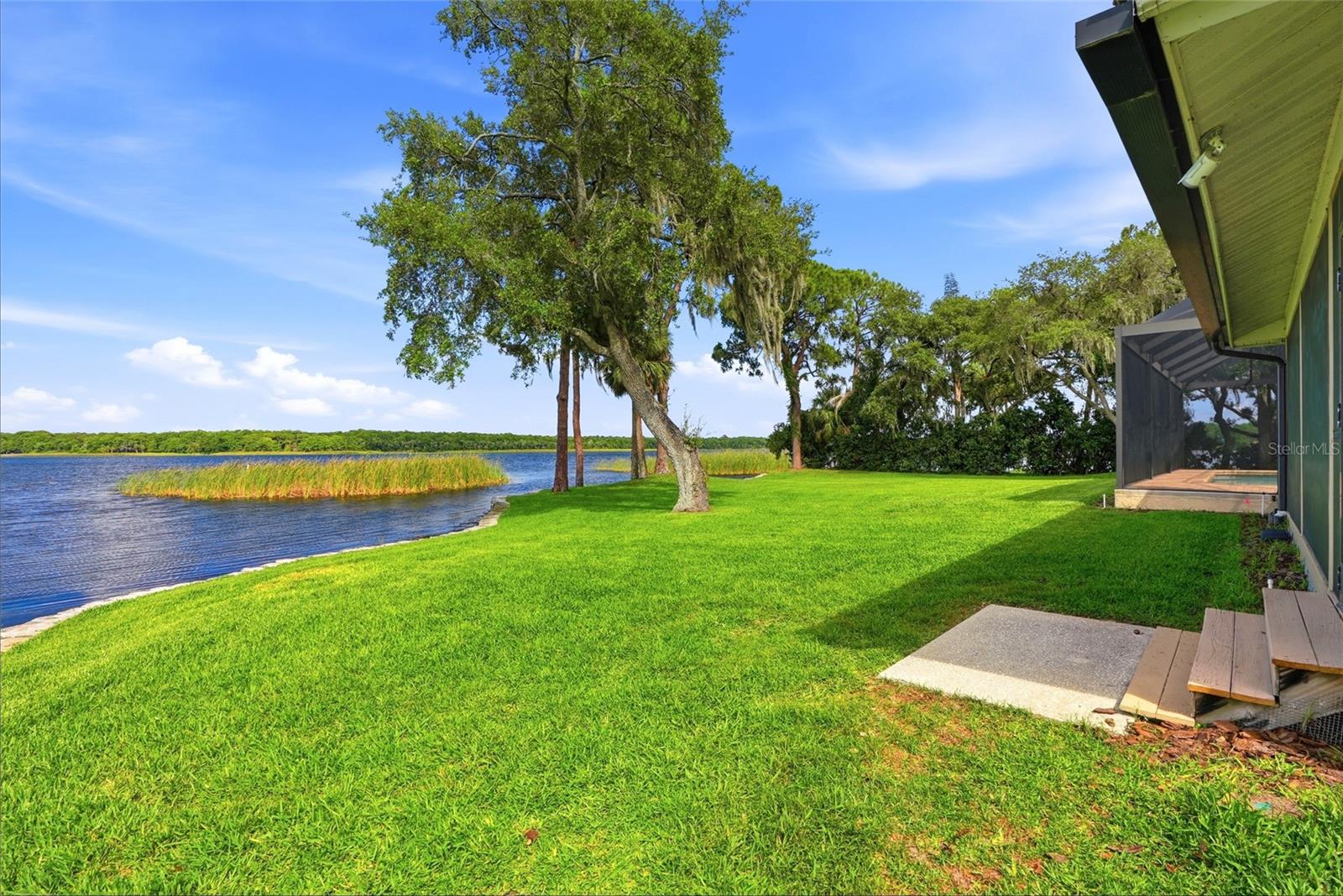 You are continuously greetedby breathtaking views andserenity offered by LakeTarpon and the residentEagles, Herons and Egrets fromevery angle and room of thishome.