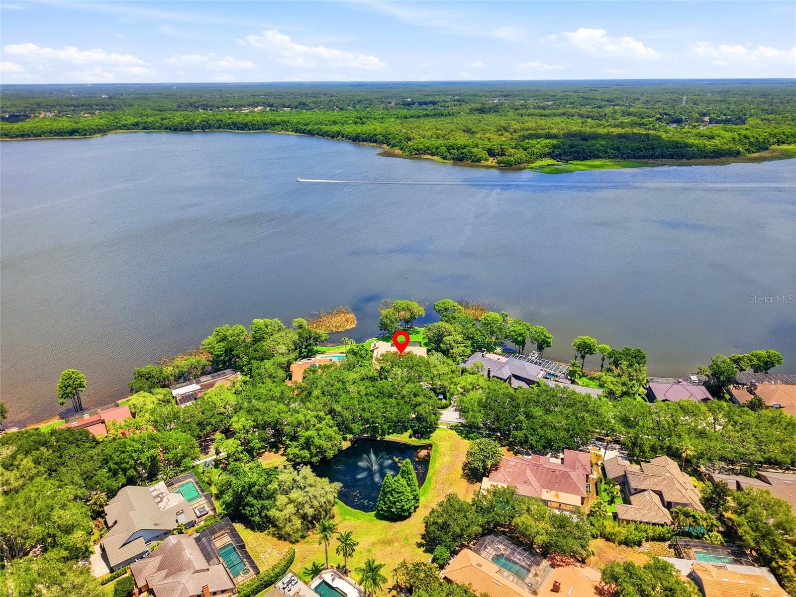 Your view across the lake isJohn Chestnut Sr. Park — abeautiful preserve offering arare view without housesacross the water.
