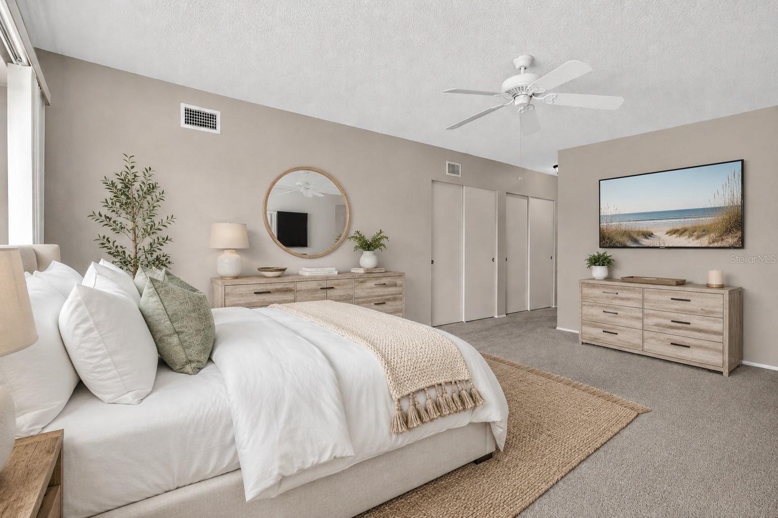 Large primary bedroom with large closets. Virtual stage