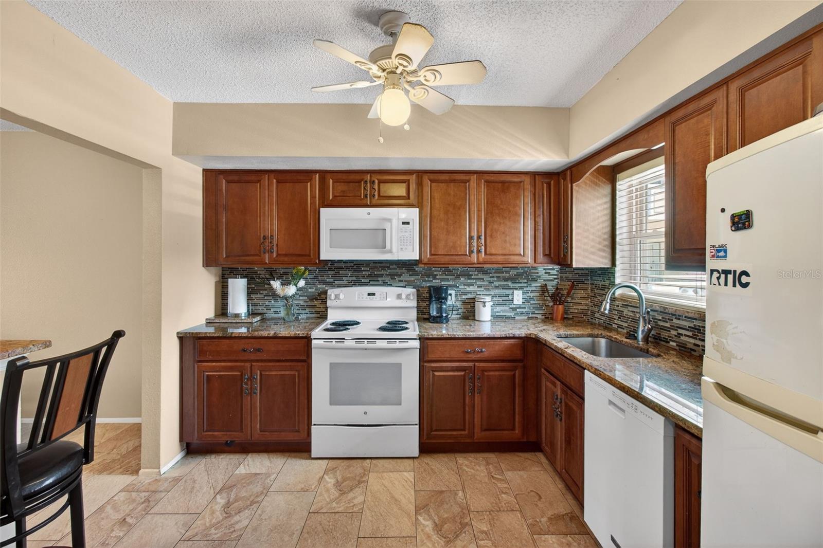 Open concept kitchen with eat in area! Soft close cabinets!