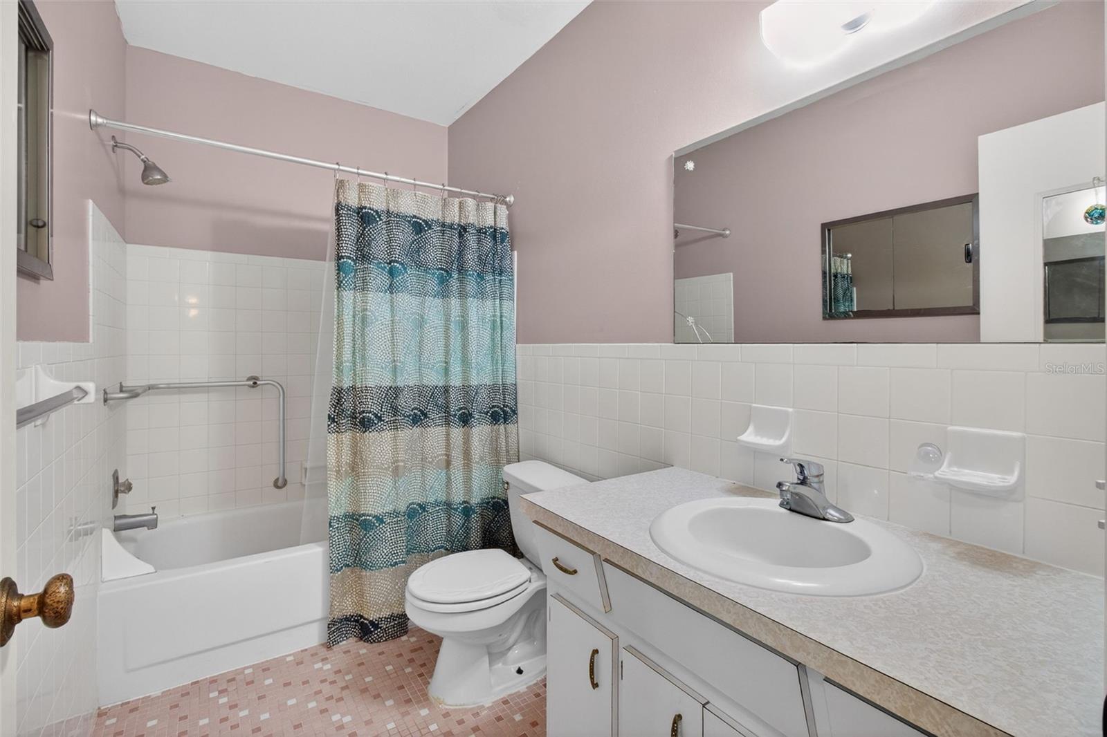2nd bathroom with bathtub and shower