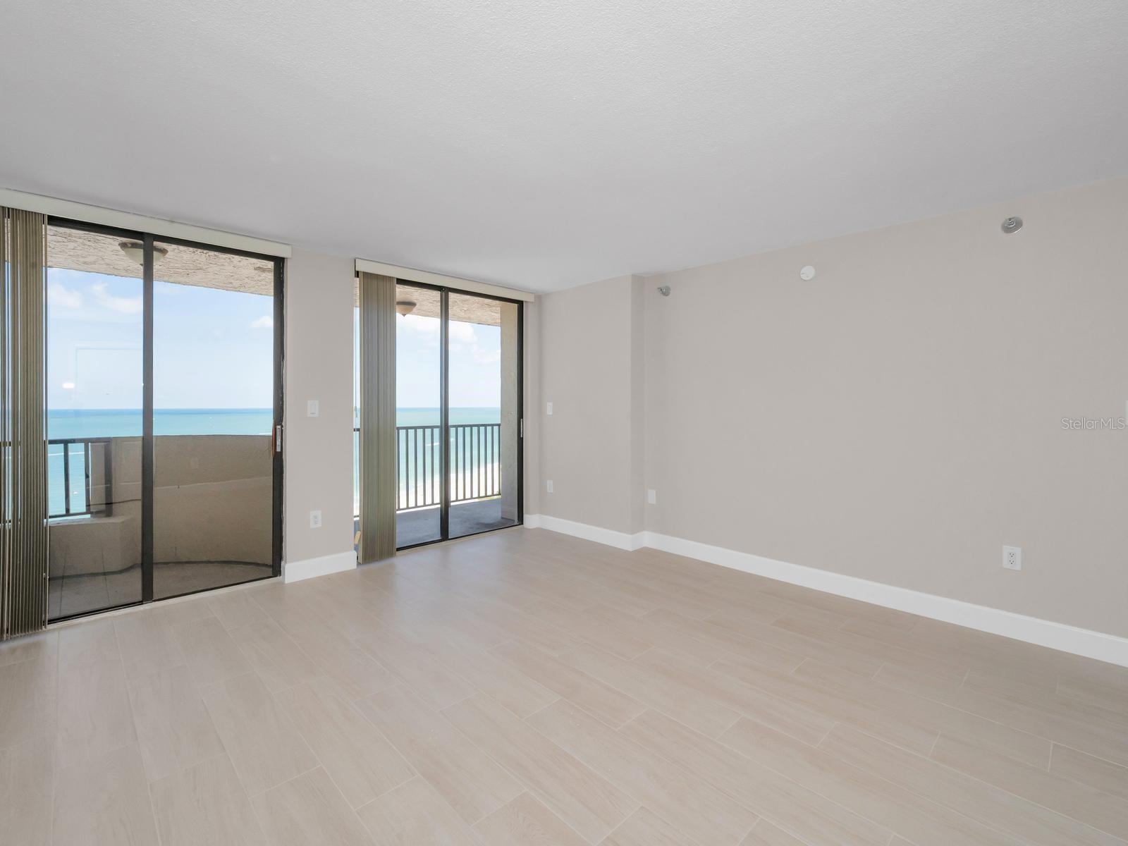 Master Suite boasts upgraded modern bath; Features a Spacious Walk-In Shower offering a relaxed Harmony, seascape views with private terrace access and Walk-In Closet.