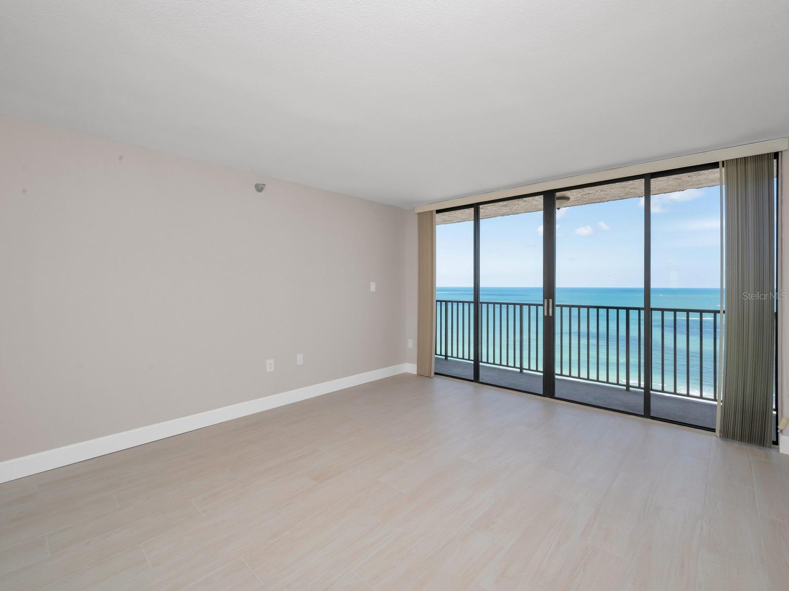 Great Room Light & Bright Contemporary Interior.  Plank Tile Floors Throughout.  GULF-FRONT Direct Aquamarine Gulf Views!