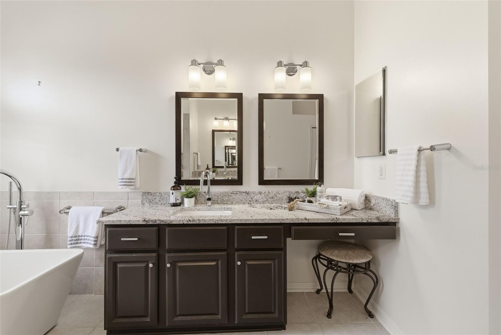 Primary bathroom dual split vanities