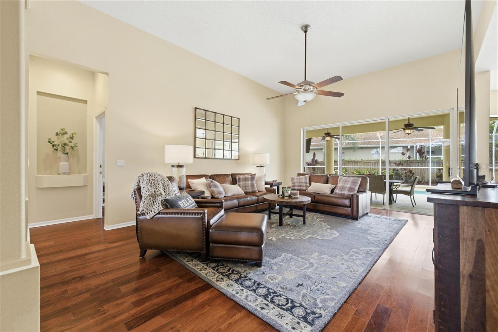Large living area with pool access