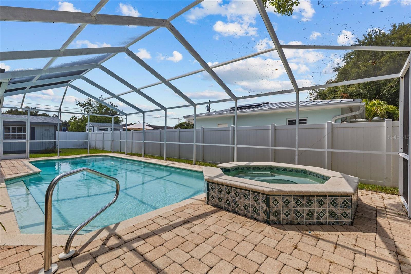Pool with spa overfill