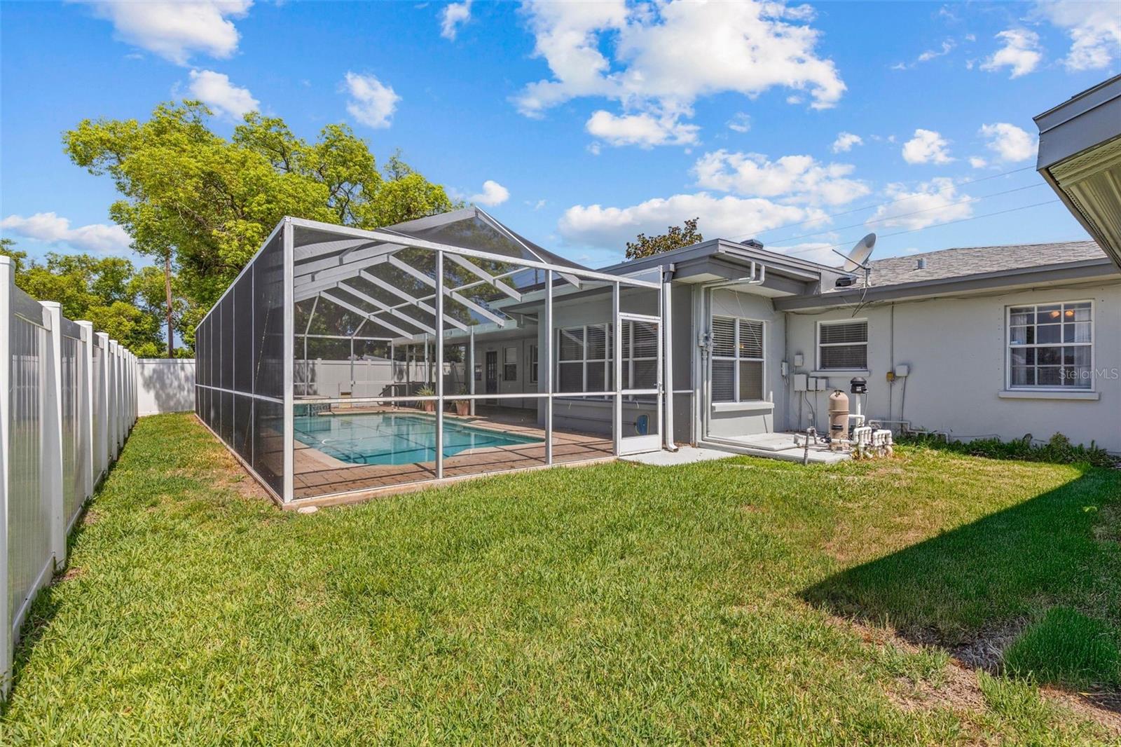 Pool cage in backyard