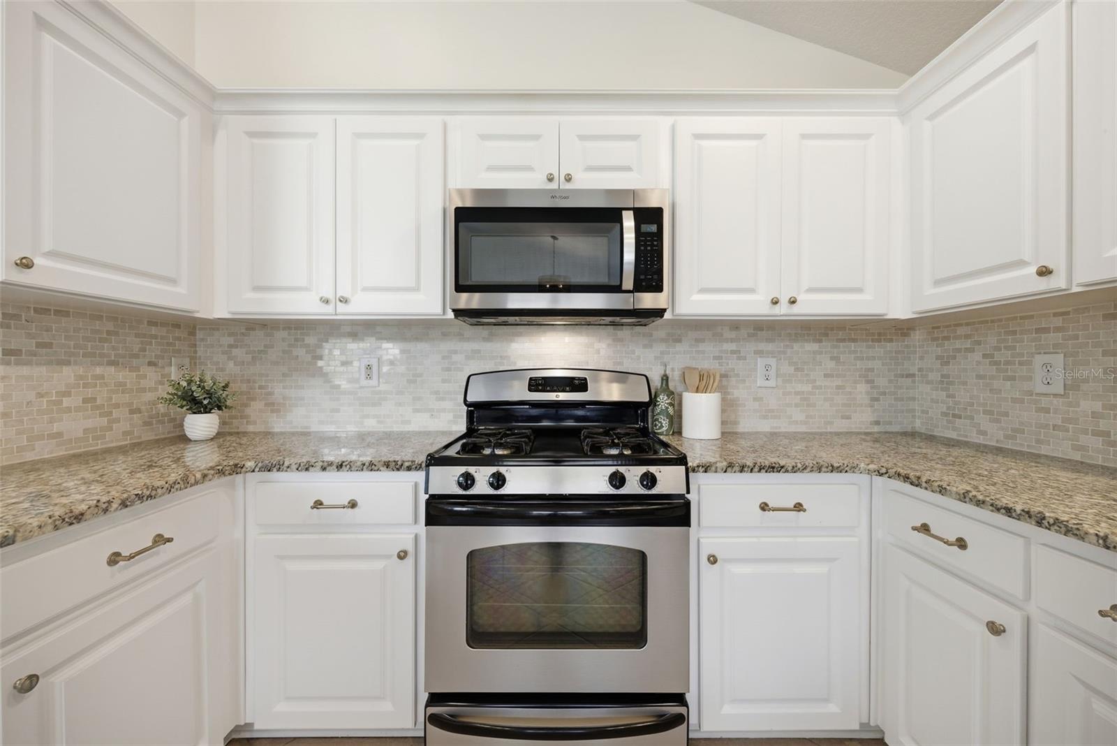 Travertine mosaic backsplash