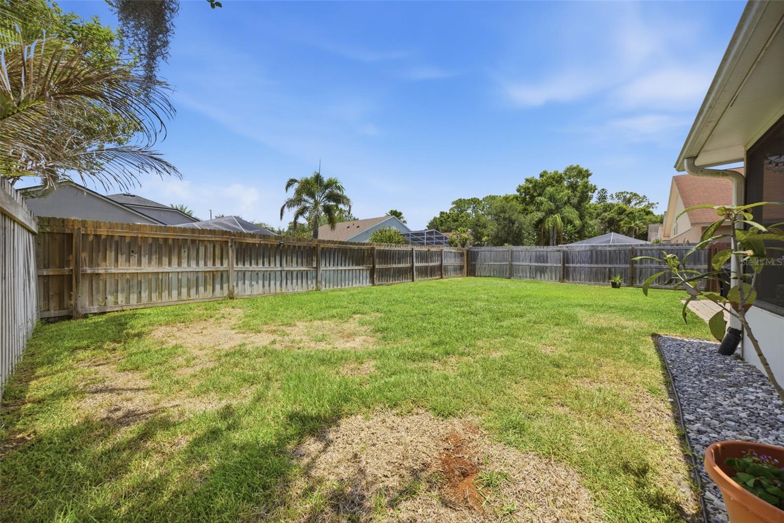 Large, fenced back yard