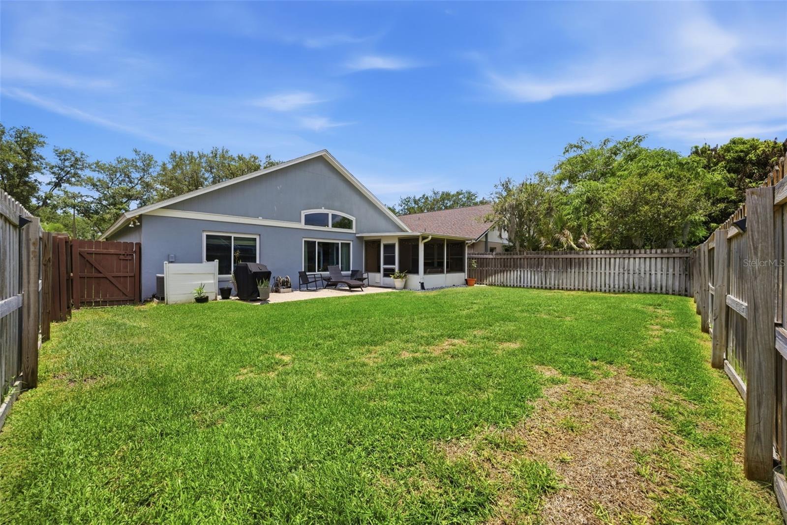 Large, fenced back yard