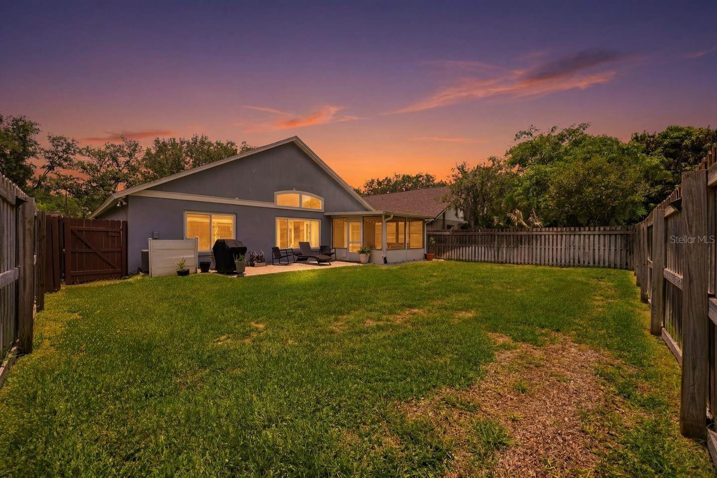 Large, fenced back yard