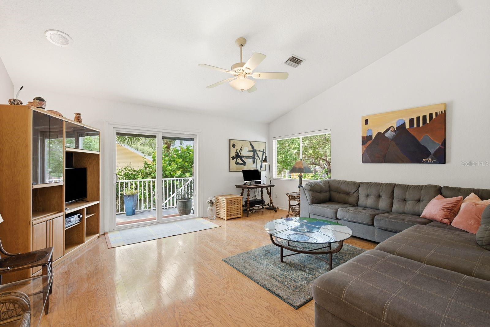 Living room. Hurricane rated sliders with built in blinds.