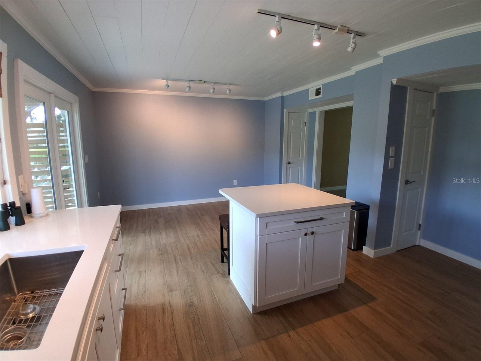 Long view of spacious country kitchen.