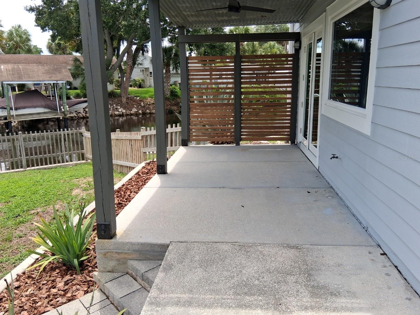 Back walk and 16'x8' covered porch