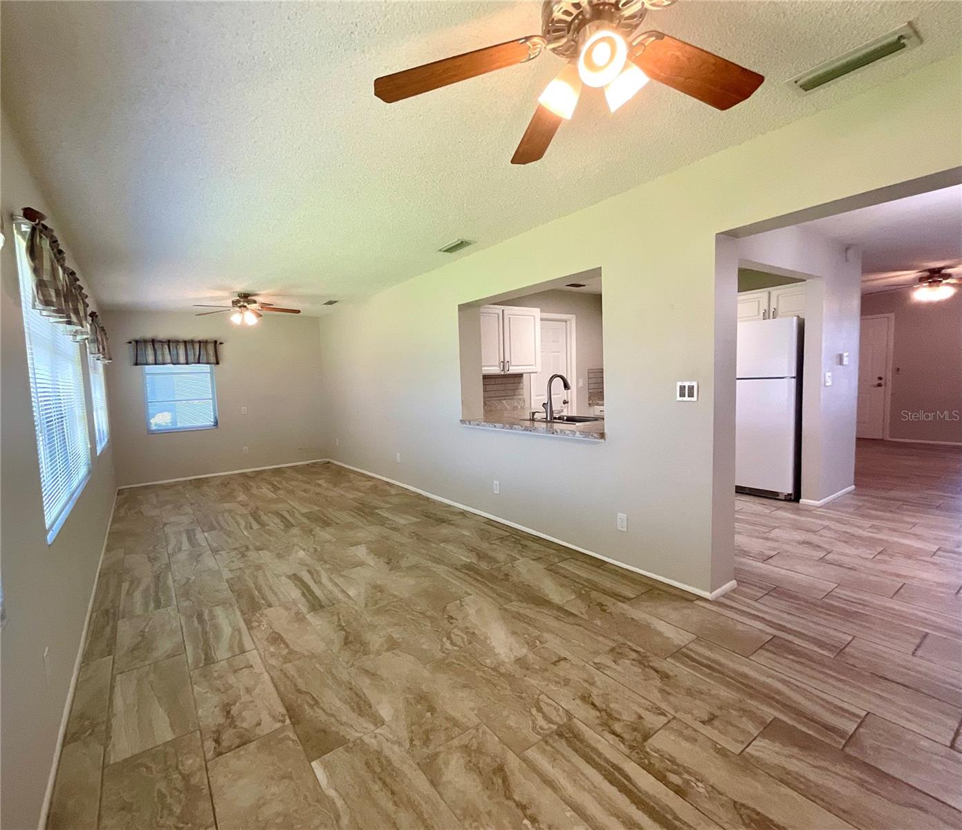 Family room view of kitchen opening