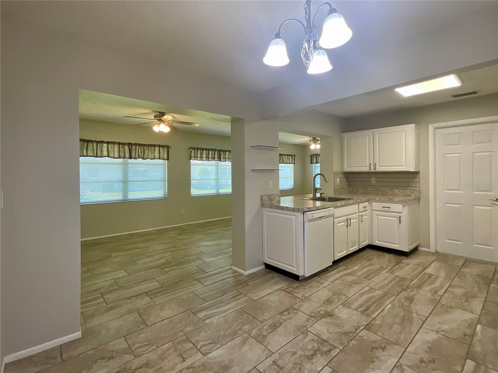 Dining room view to kitchen and family room