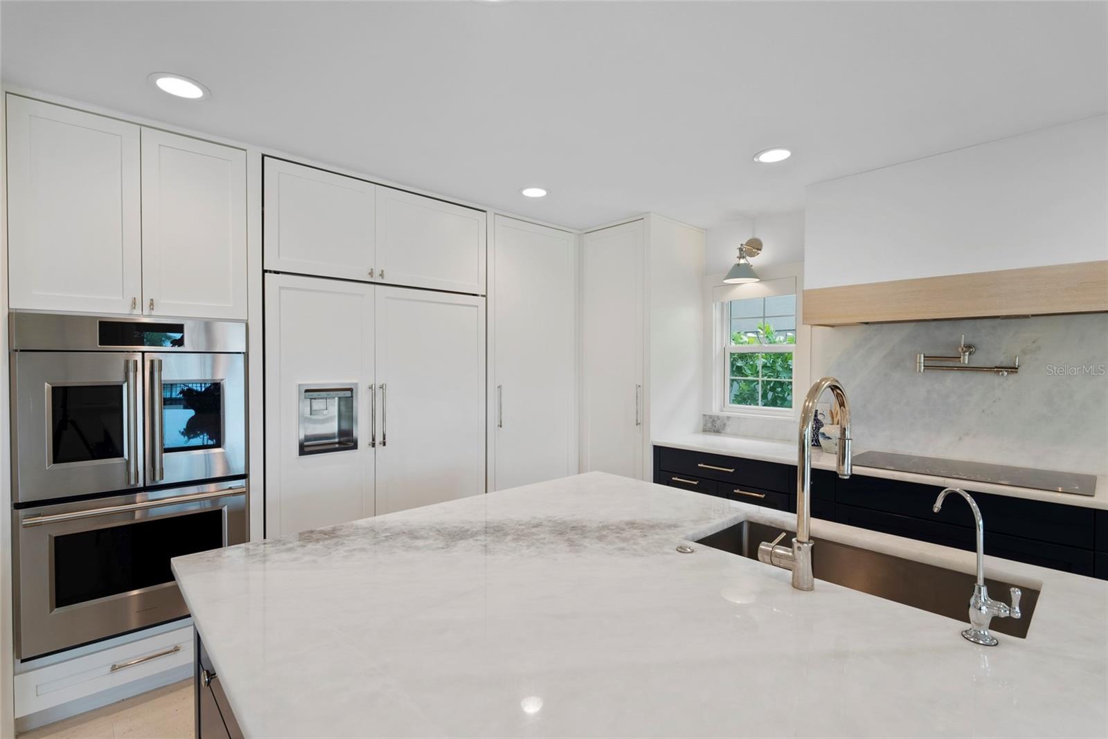 Double Monogram Ovens, Cabinet depth Monogram refrigerator, Induction stove top with pot filler faucet