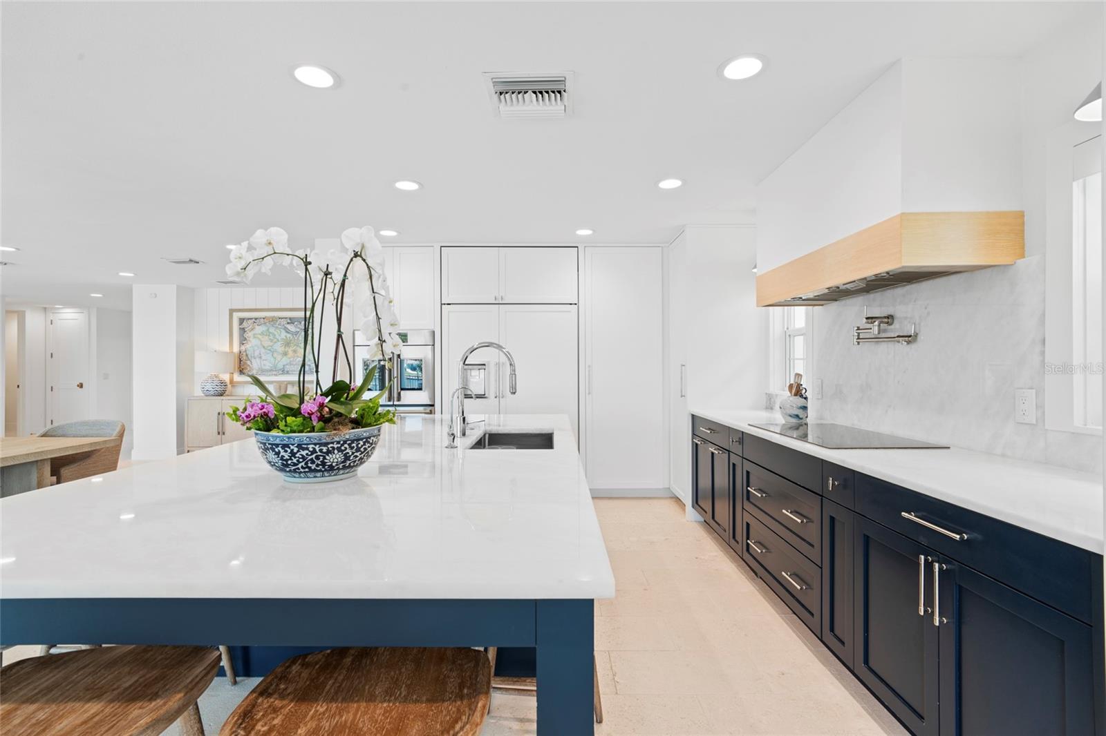 Natural Stone countertops, full backsplash & large hood