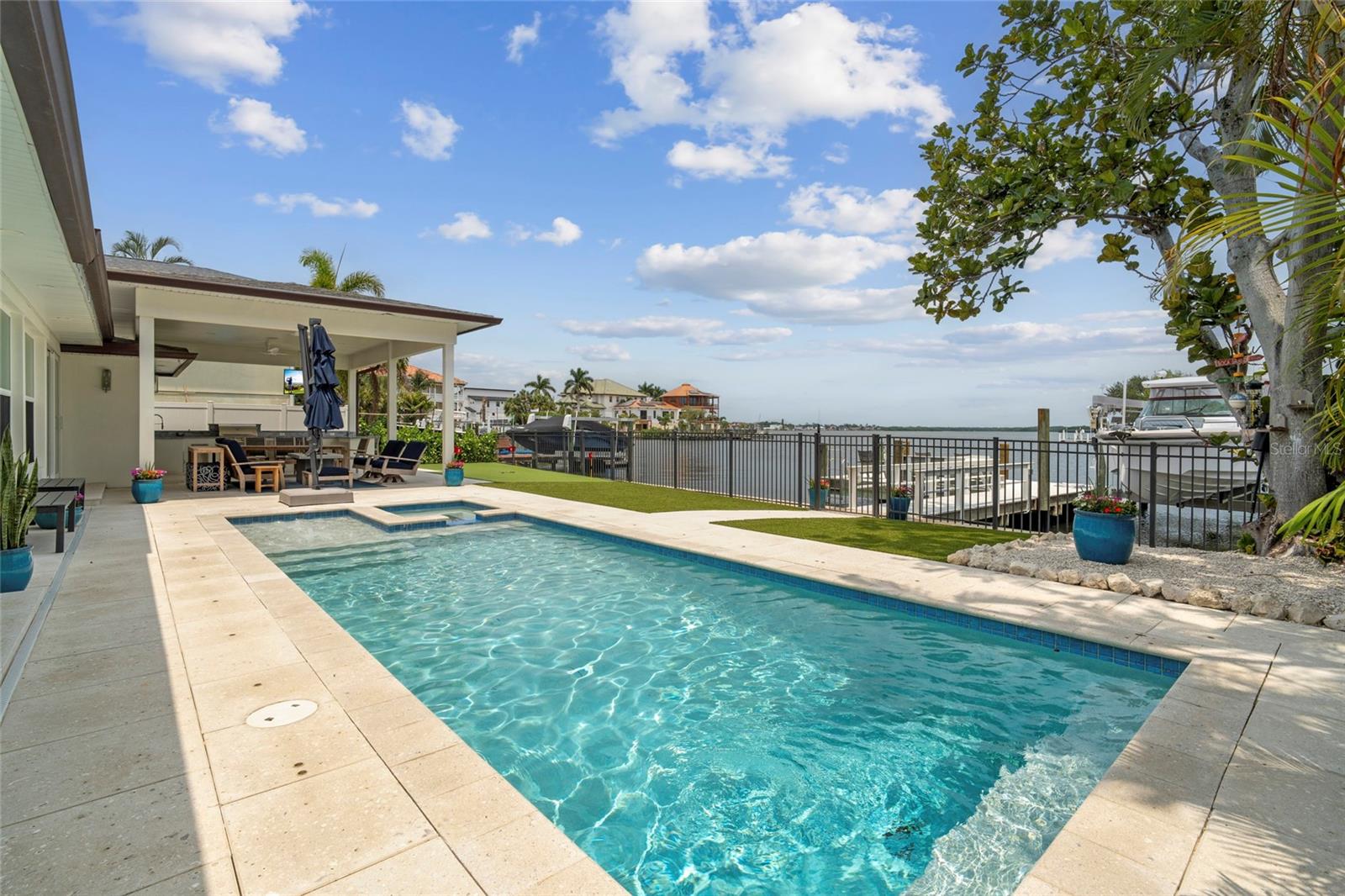 heated salt water pool, shell stone pavers