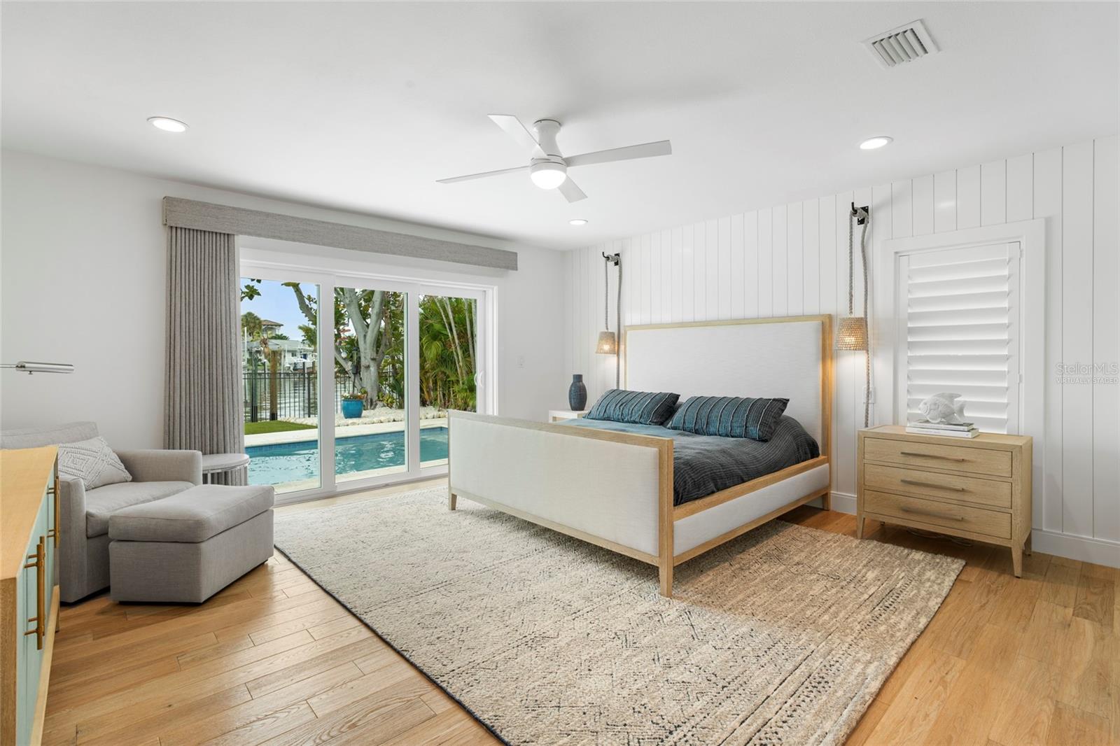 Master suite w/2 walk in closets, custom cabinetry, shell stone tile, virtually staged