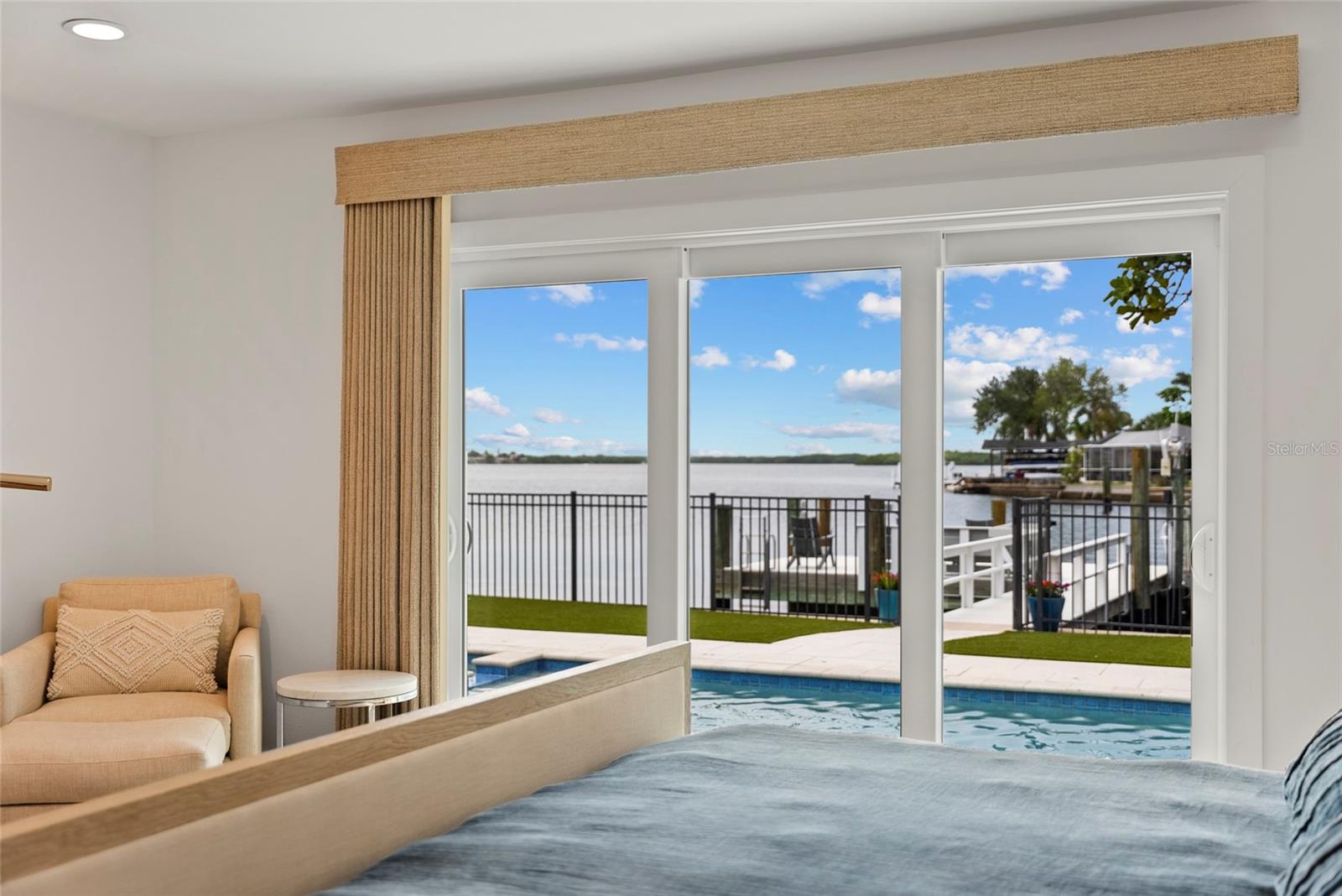 Master suite water view, vitually staged