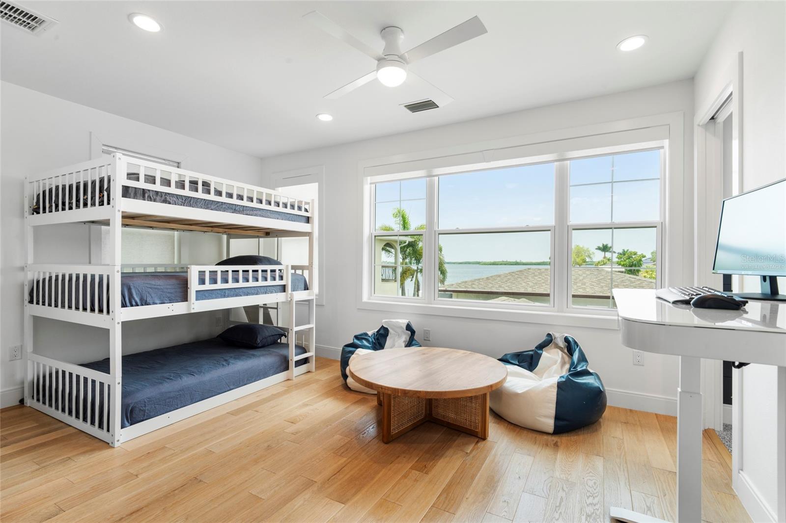 Window treatments include electric blinds  & plantation shutters, virtually staged