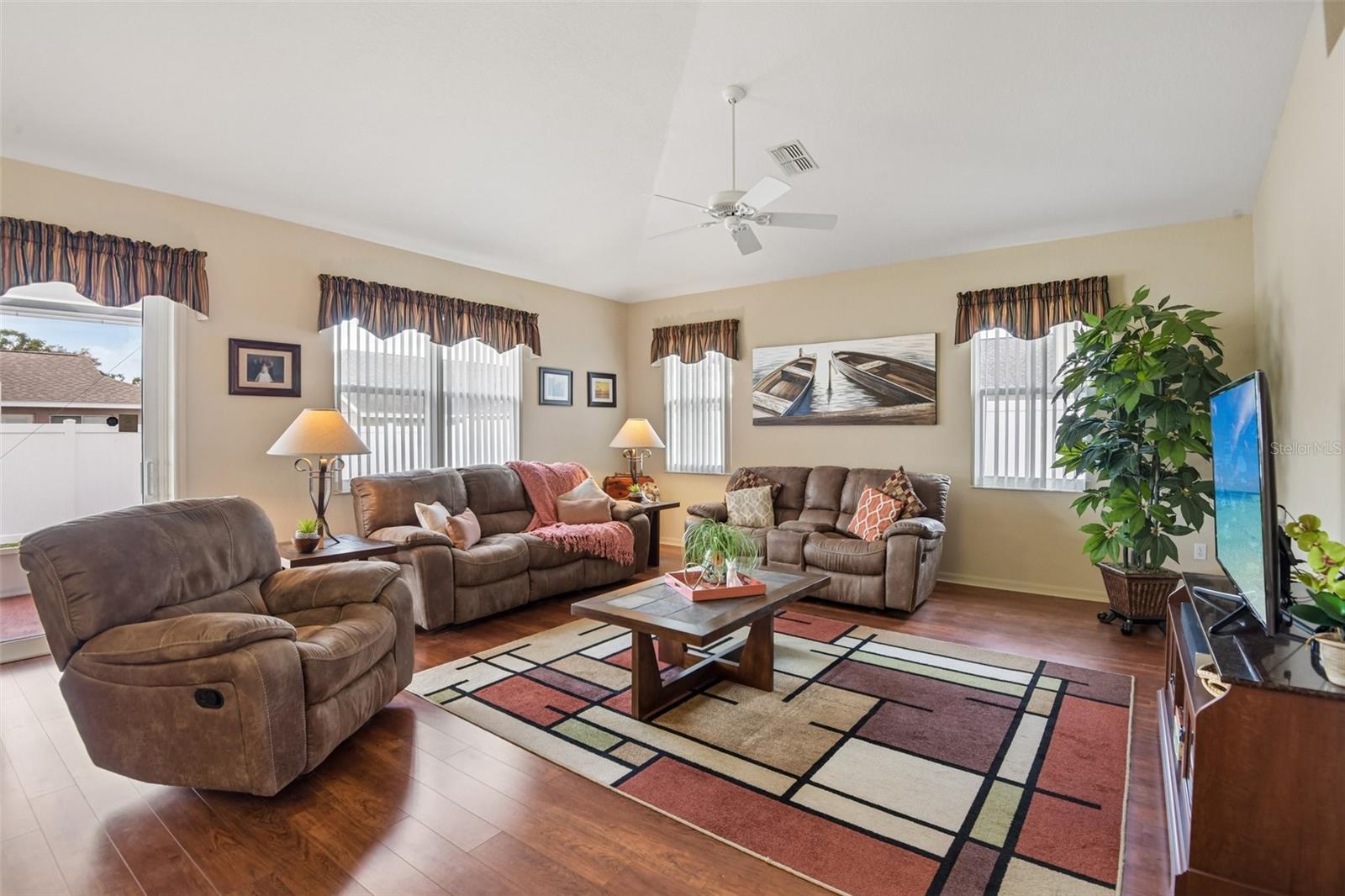 Living Room backs up to lanai / backyard