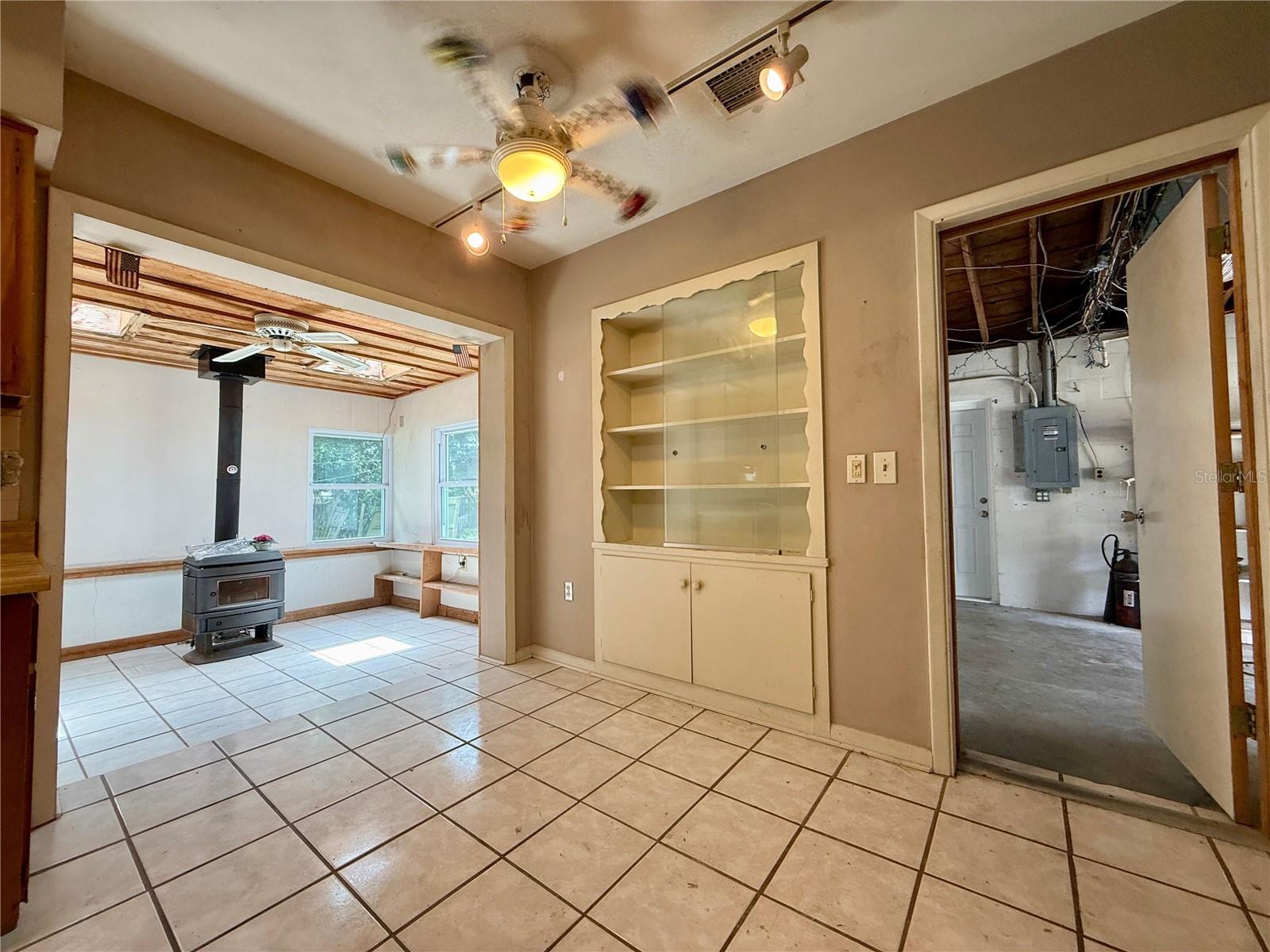 Get rid of the shelving to gain access to garage