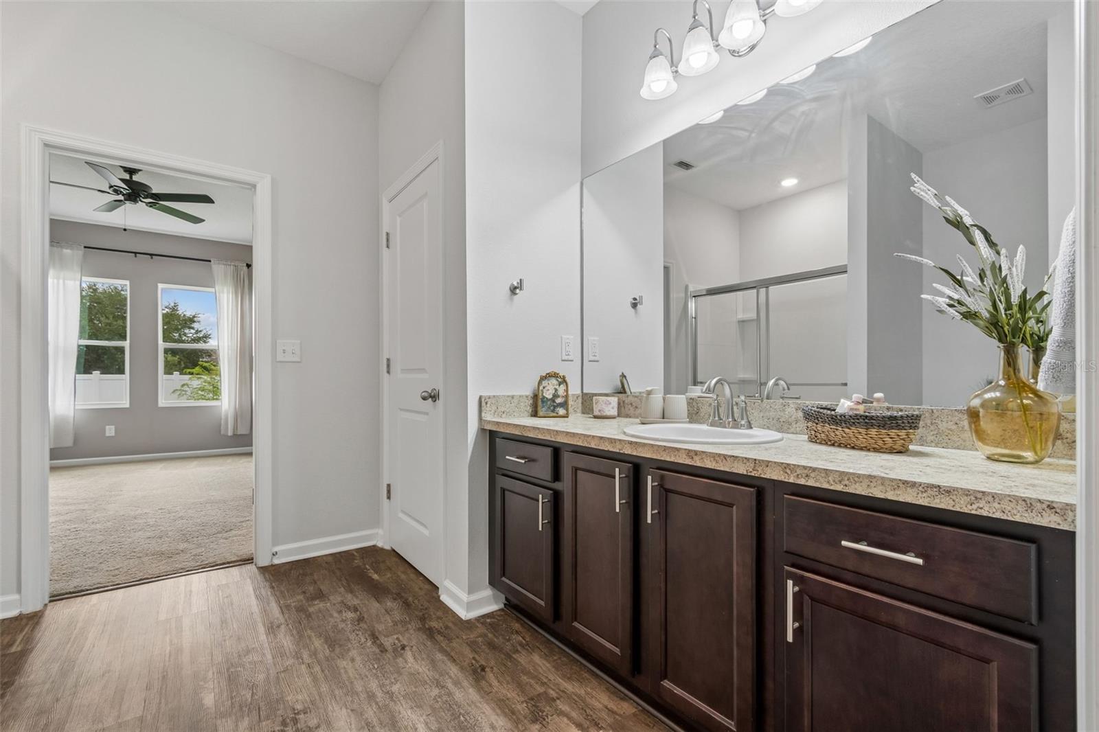 Generous cabinetry and mirror