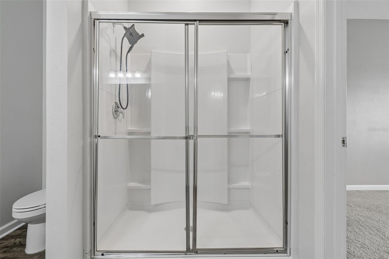 En-suite Primary Bathroom with expansive shower