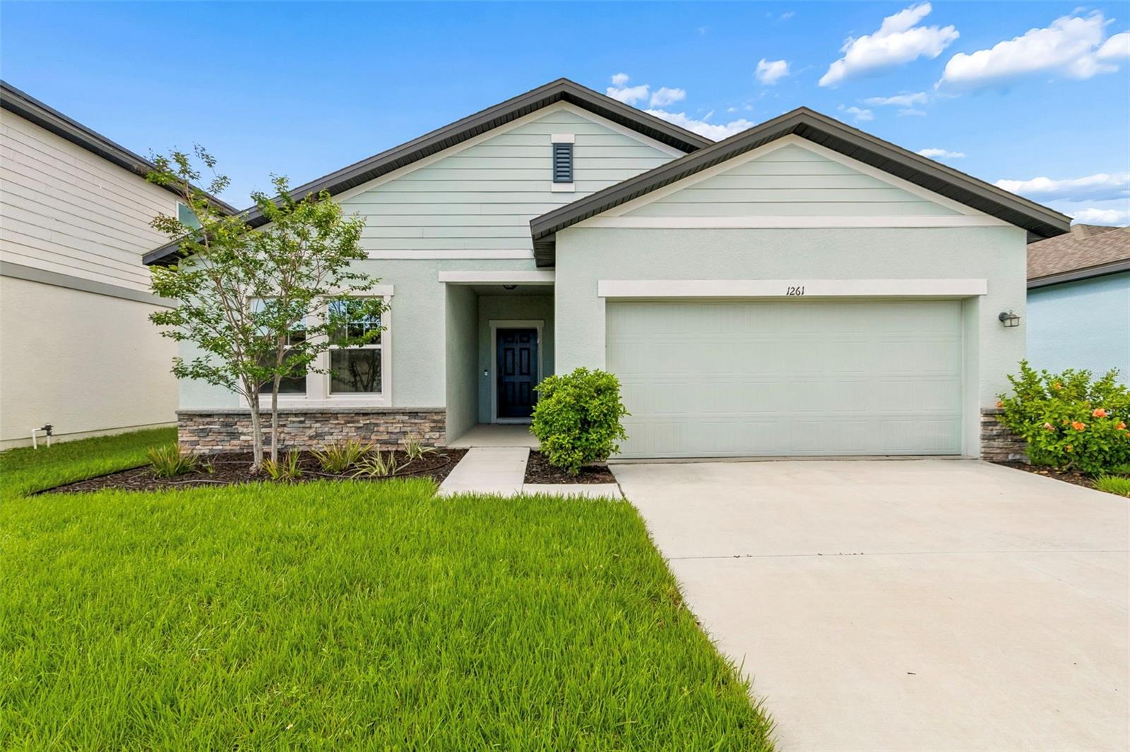 Featuring lush lawn through out the property.