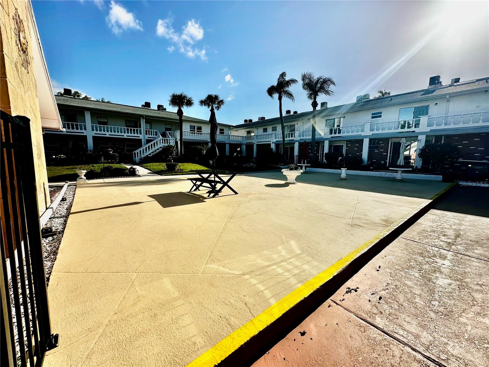 Courtyard to Bring Your Chair or use Community Chairs to enjoy and Soak up the Florida Sunshine