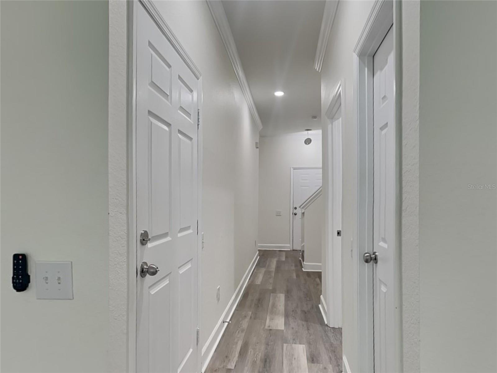 Foyer.  Garage on Left Half Bath on Right