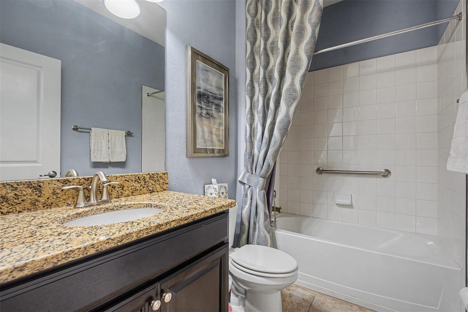 Guest bathroom with tub/shower combo