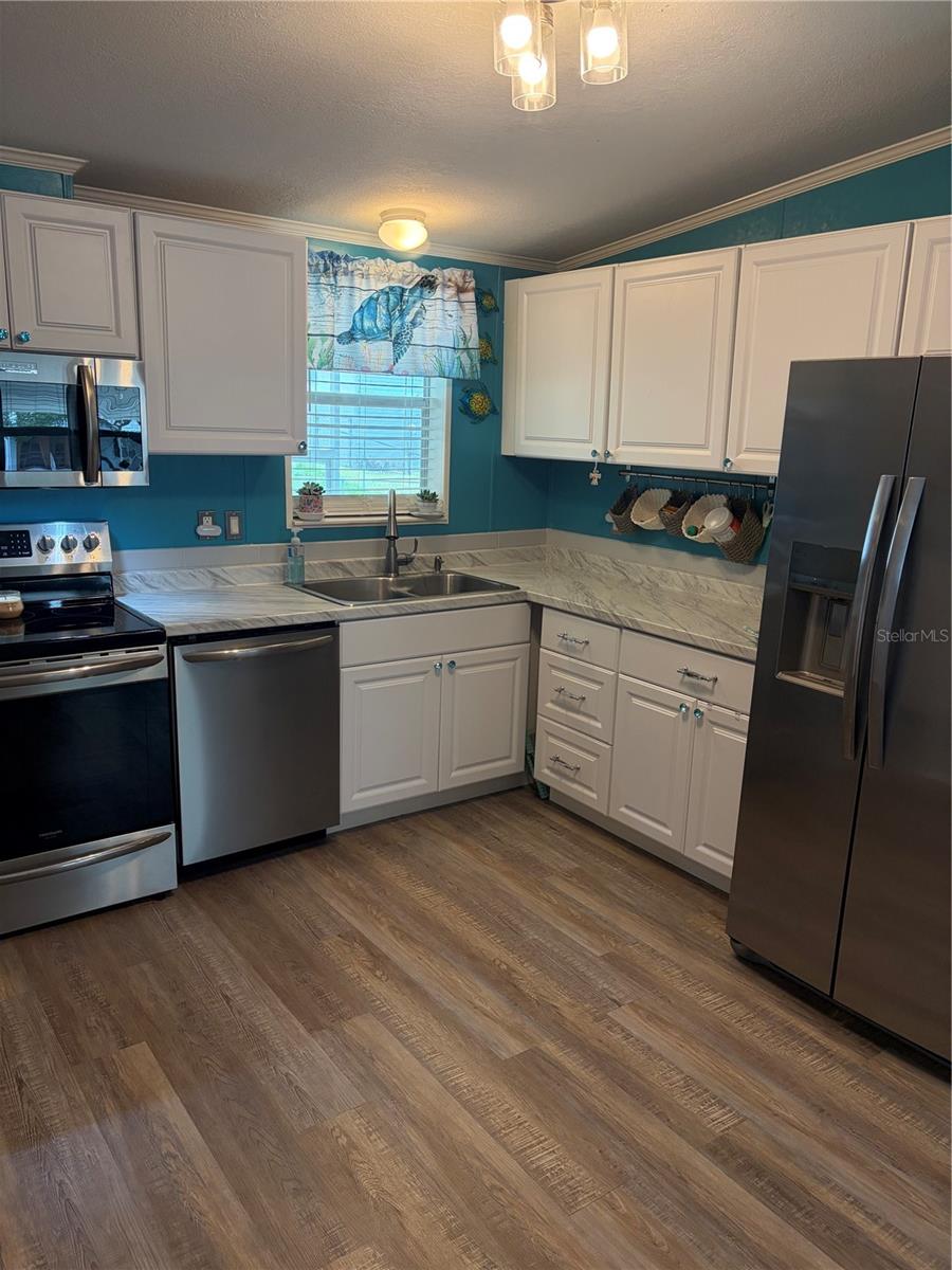 Step saver kitchen big enough for a kitchen table.