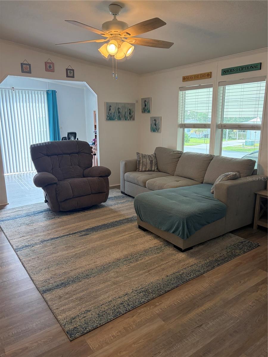 Living room showing alcove for den/computer room/flex space.