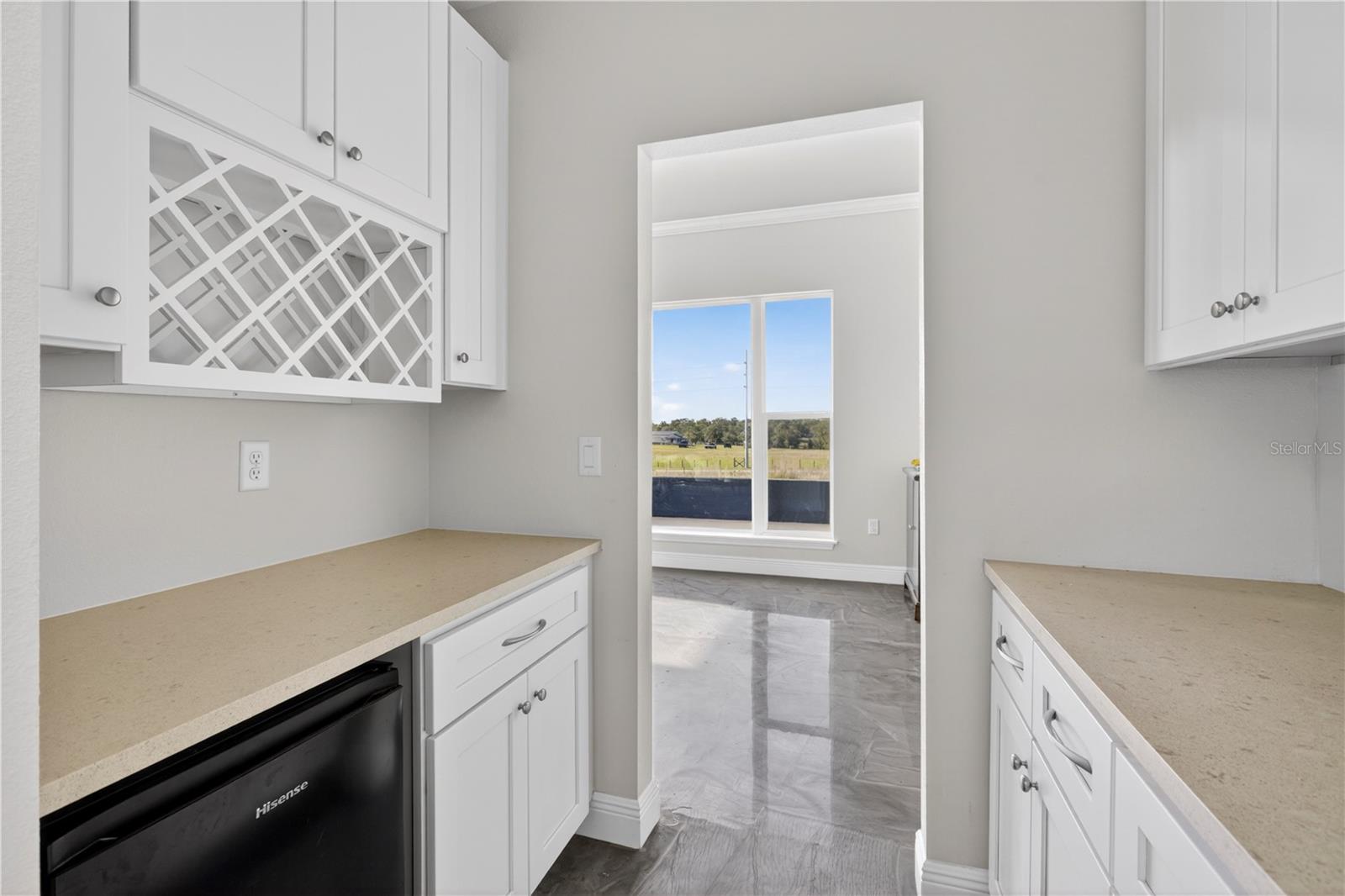 Butler's Pantry Complete with wine racks and beverage fridge