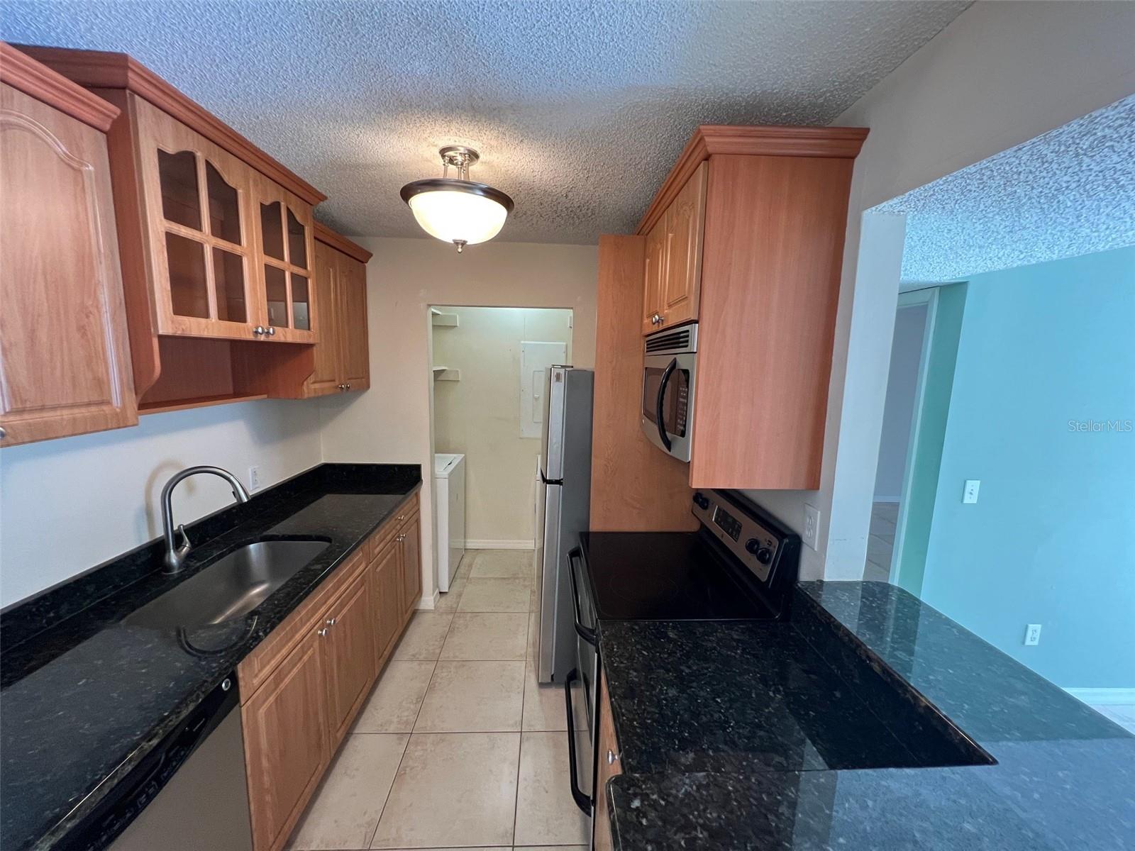 Kitchen with laundry closet