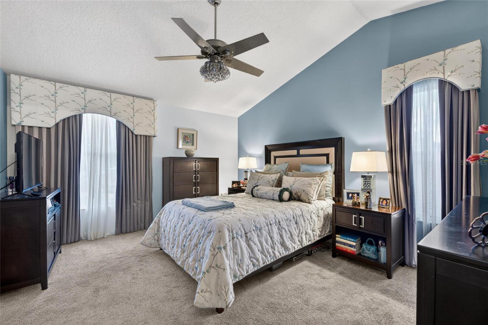 PRIMARY BEDROOM-2ND FLOOR. CUSTOM MADE CORNICE, BEDSPREAD, AND SHOWER CURTAIN!