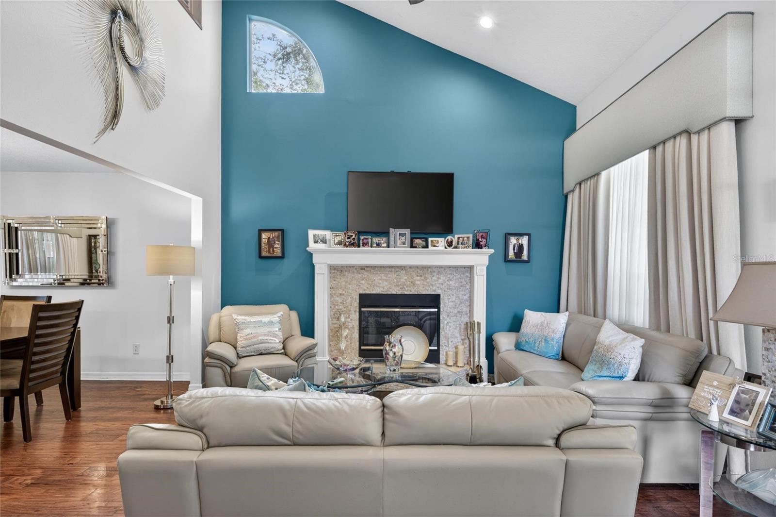 LOVELY FAMILY ROOM WITH WOOD BURNING FIREPLACE!